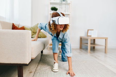Virtual Reality Joy: A Smiling Woman Enjoying Futuristic VR Gaming at Homeの写真素材