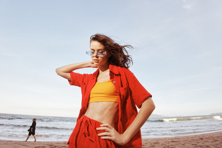Smiling Woman with Open Mouth, Embracing Freedom and Joy on a Colorful Beach at Sunset