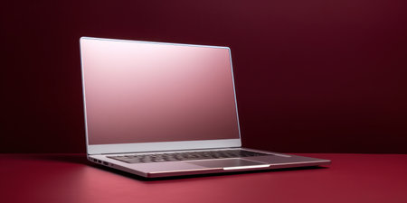 Modern Business Workspace: Laptop on White Desk with Digital Screen and Blank Notebookの素材