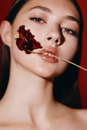 Pretty Red-haired Woman: Glamorous Portrait of Young, Fashionable Model with Attractive Makeup and Rose Lips on White Backgroundの写真素材