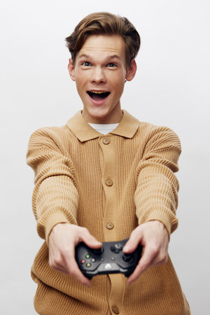 Happy Young Gamer Enjoying Console Gaming in the Comfort of Home