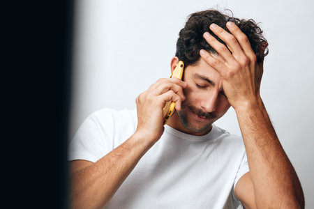 Online man lifestyle portrait message travel hipster phone t-shirt white technology confidentの写真素材