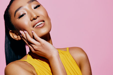 Woman stylish excited yellow fashion surprised portrait beauty lifestyle trendy smile pink