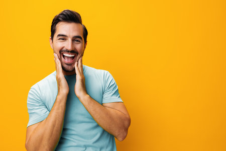 Man background portrait trendy lifestyle gesture studio fashion smilingの写真素材