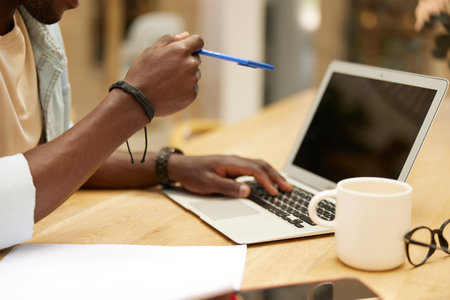 Woman desk hand business computer person notebook working laptop technology table femaleの写真素材