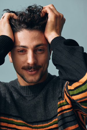 Handsome man face smile positive trendy sweater model portrait copyspace hipster fashionの写真素材