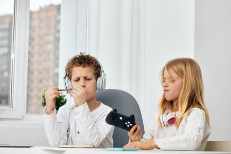 Happy Kids Playing and Taking a Selfie Together with a Smartphone in Cozy Home Interior
