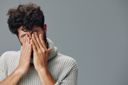 Man young person stress sad upset face depressed portrait unhappy male adult expressionの写真素材