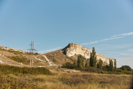 Blue sky serenity a tranquil travel escape with clear skies and stunning views of natureの写真素材