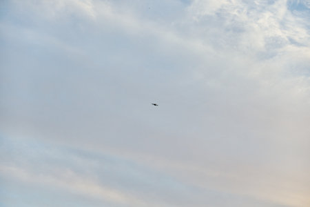 Airplane flying in the sky with a cloud background on a sunny day for travel destination concept