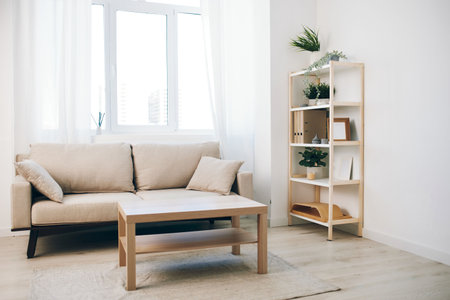 Serene Sofa Escape: A Blissful Woman Relaxing in a Modern Comfort Zoneの写真素材