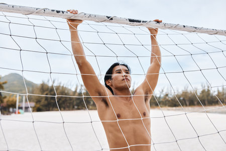 Muscular Asian Athlete Enjoying Beach Run at Sunset