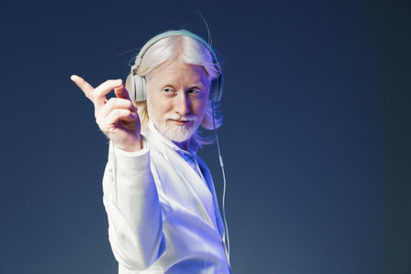 elderly man with headphones dancing, retro style, joyful expression on a gradient background,...