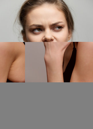 Confident young woman biting a string while posing against a neutral background, showcasing a bold and fierce expression. Fashion and personal style concept.の写真素材