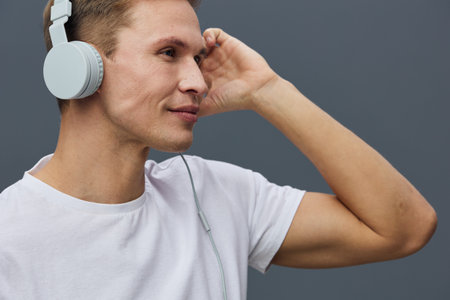 young caucasian man with headphones listen music relax mental health mindfulness concept casual...