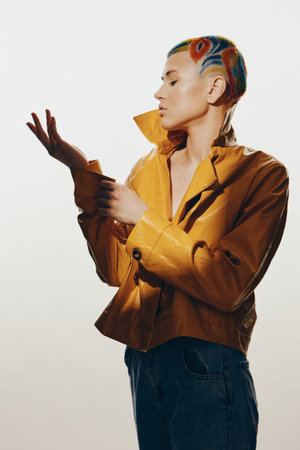 woman with colorful hair art in a yellow jacket posing thoughtfully, stylish casual outfit, creative...