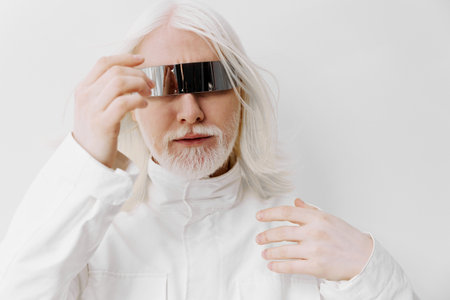 Futuristic man with silver hair wearing reflective glasses, set against a bright white background,...