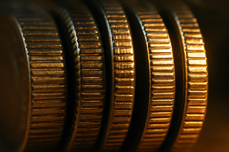 golden coins macro close up with shallow depth of field, business conceptの素材