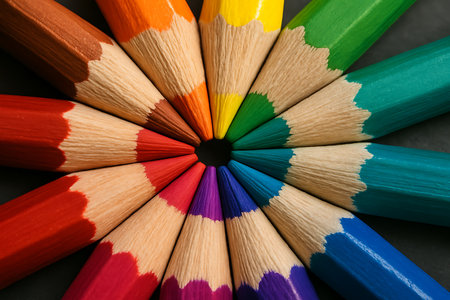 Colorful pencils on gray background, closeup. School suppliesの素材