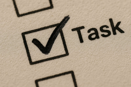 Tick and check box on paper background. Close-up.の素材