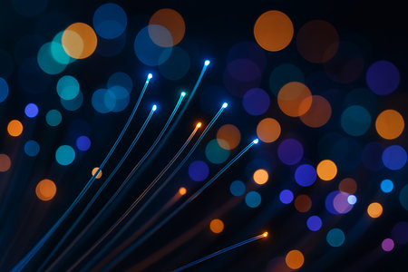 fiber optical network cable in abstract technology concept with bokeh backgroundの素材