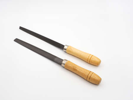 Two metal files with wooden handles. Carpenter's tool on a white background.の写真素材