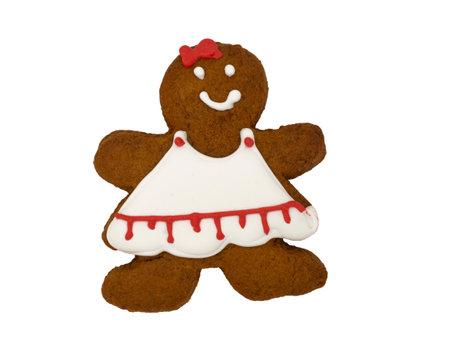 Christmas gingerbread on a white background. Girl Christmas tree. Brown homemade cookies in colored...