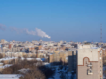 Winter small city in the snow from a bird's-eye view (panorama of the city from a flying drone). Kirov, Russia.の写真素材