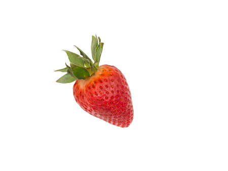 Red, fresh, ripe early strawberries isolated on a white background. A photo of a real berry, a...