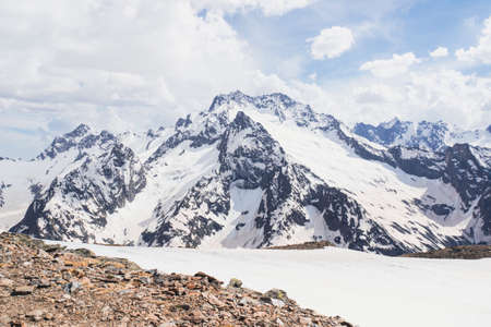 Mountains covered with snow at the Caucasian Dombay ski resort in Russia.