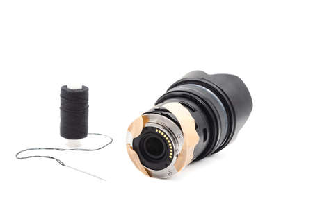 Poor quality repair of the camera lens. Lens photo is fixed with a plaster (adhesive bandage) on a...