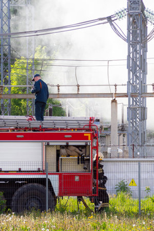Kirov, Russia - June 3, 2022: Firefighters are looking at open fire. Short circuit at power plant....