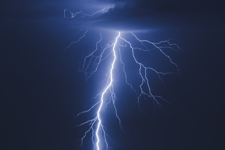 There are many lightning bolts against the black sky. Night photo of a thunderstorm on a long...