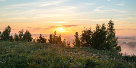 Morning misty landscape at dawn by the river. Wild, deserted northern nature.の写真素材