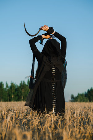 Hooded woman with a scythe stands in a field, exuding a mystical and eerie vibe, suggesting a ritual...