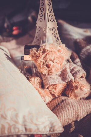 Outdoor decorated scene with pillows, eiffel tower and teddy bearの写真素材