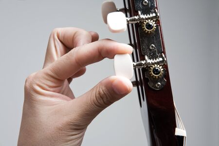 Tuning guitar