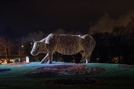Christmas cow sculpture made of lights, Flower Cow in Ventspils, Latviaの写真素材
