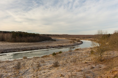 Panoramic view of scenic winter landscape. River and frozen trees at winter morning in Russia