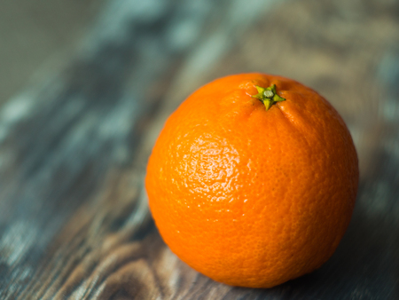 Fresh mandarine on wooden table, close upの写真素材