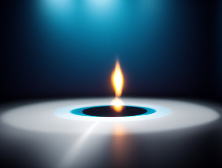 Illustration of burning candle on dark background with light and shadow.の素材