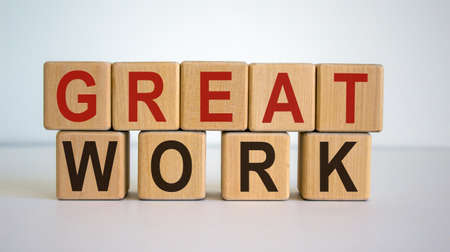Concept words 'great work' on cubes on a beautiful white background.