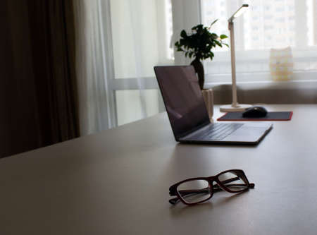 Work from home. Typical workplace of a businessman working from home.の写真素材