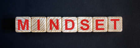 Concept word mindset on cubes over dark beautiful blue background.の写真素材
