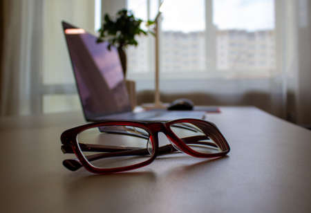 Work from home. Typical workplace of a businessman working from home.の写真素材
