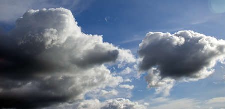 Sky with clouds and sun. Beautiful background, copy space.の写真素材