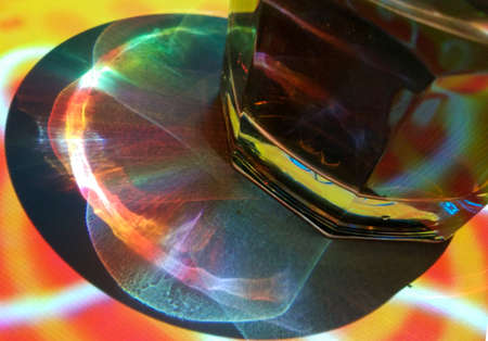 glass of wavy glass on a colorful colorful background