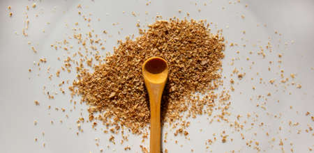 Wooden spoon and spicy composition isolated over the white background.の写真素材