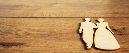 Wooden figures of man and woman