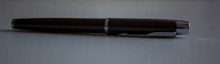 Beautiful dark pen on white office table. Concept.の写真素材